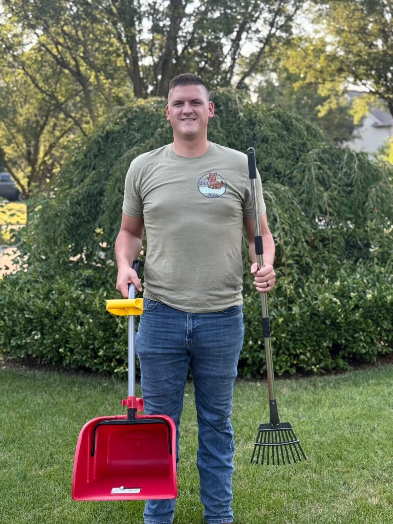 Pooper scooper holding dog poop removal equipment